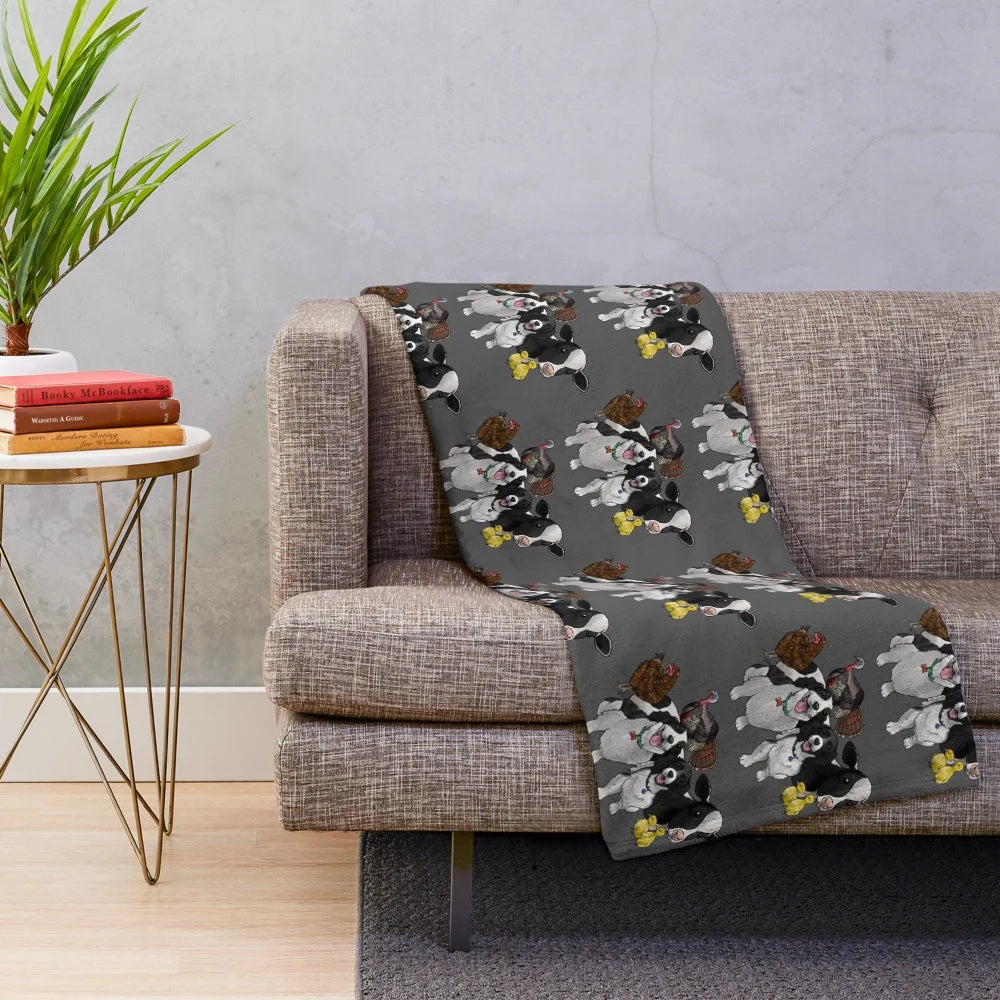 Plush blanket featuring cute cartoon illustrations of farm animals and pets