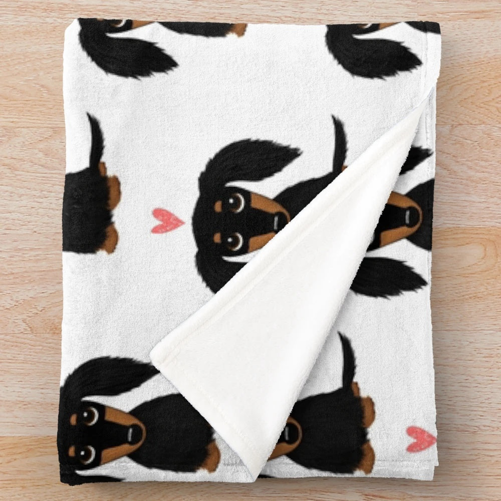 Black and tan long-haired dachshund cartoon dog with heart design plush blanket