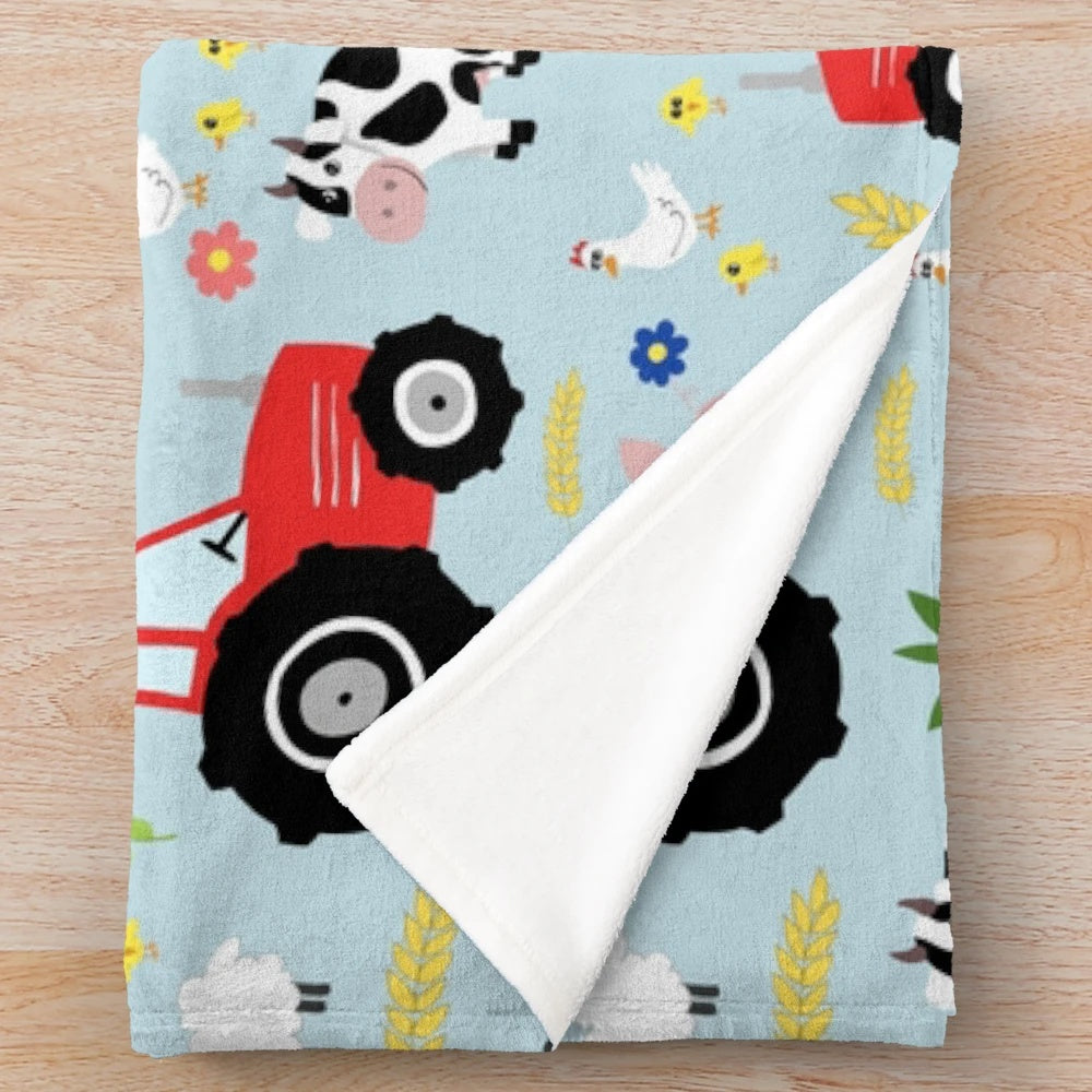 Cute kids plush blanket featuring red tractor and farm animals