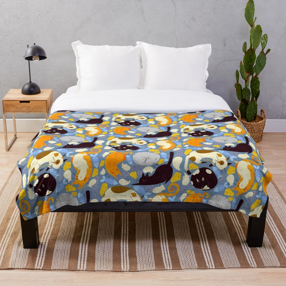 Soft and cuddly plush blanket with a charming cat and mouse pattern design