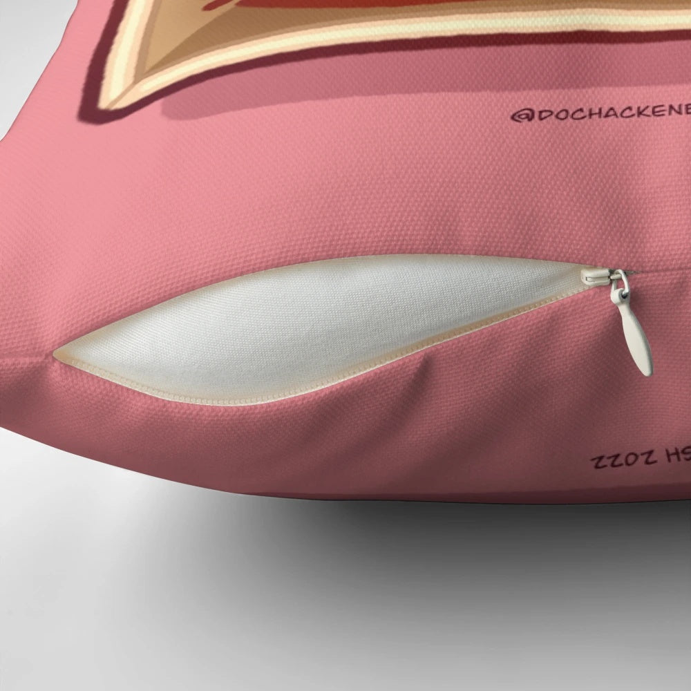 A square-shaped pillow with a cute cat peeking out of a box.