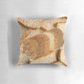 A plush, cat-shaped pillow depicting a cat in a "loaf" position, wearing sunglasses.