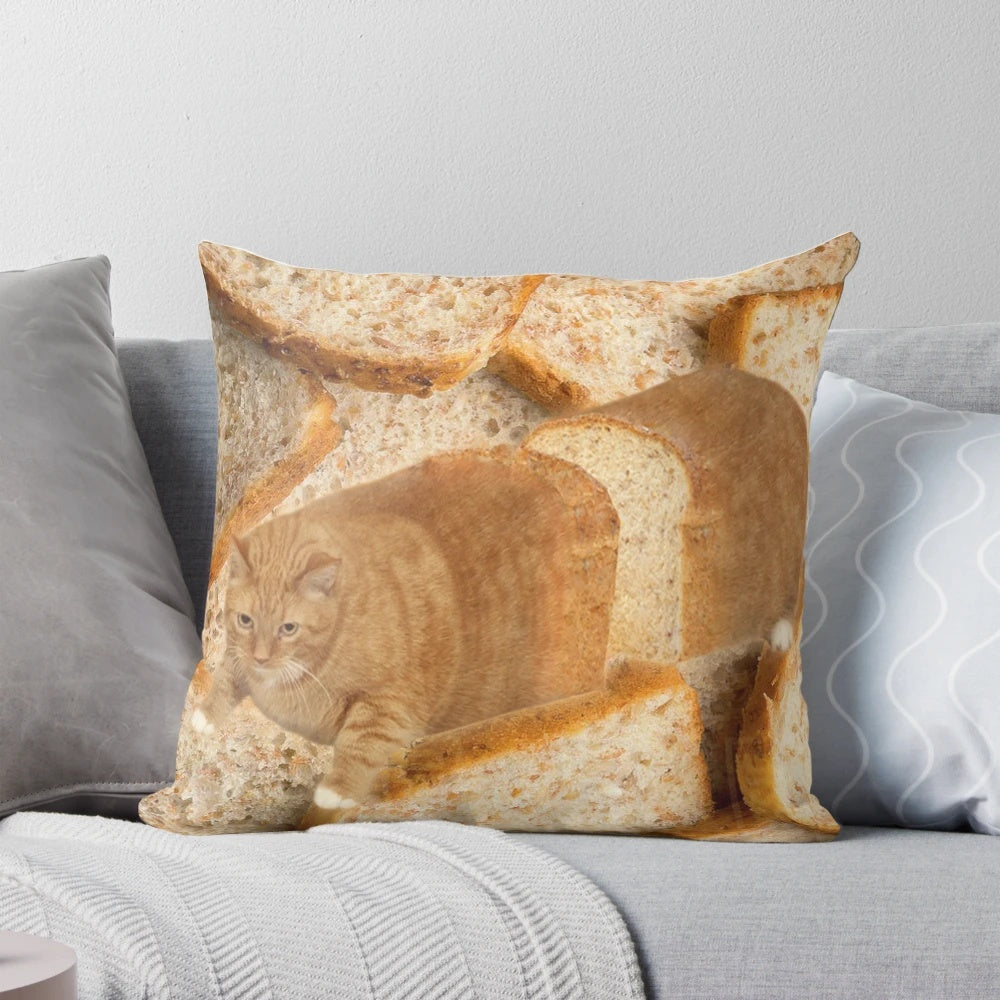A plush, cat-shaped pillow depicting a cat in a "loaf" position, wearing sunglasses.