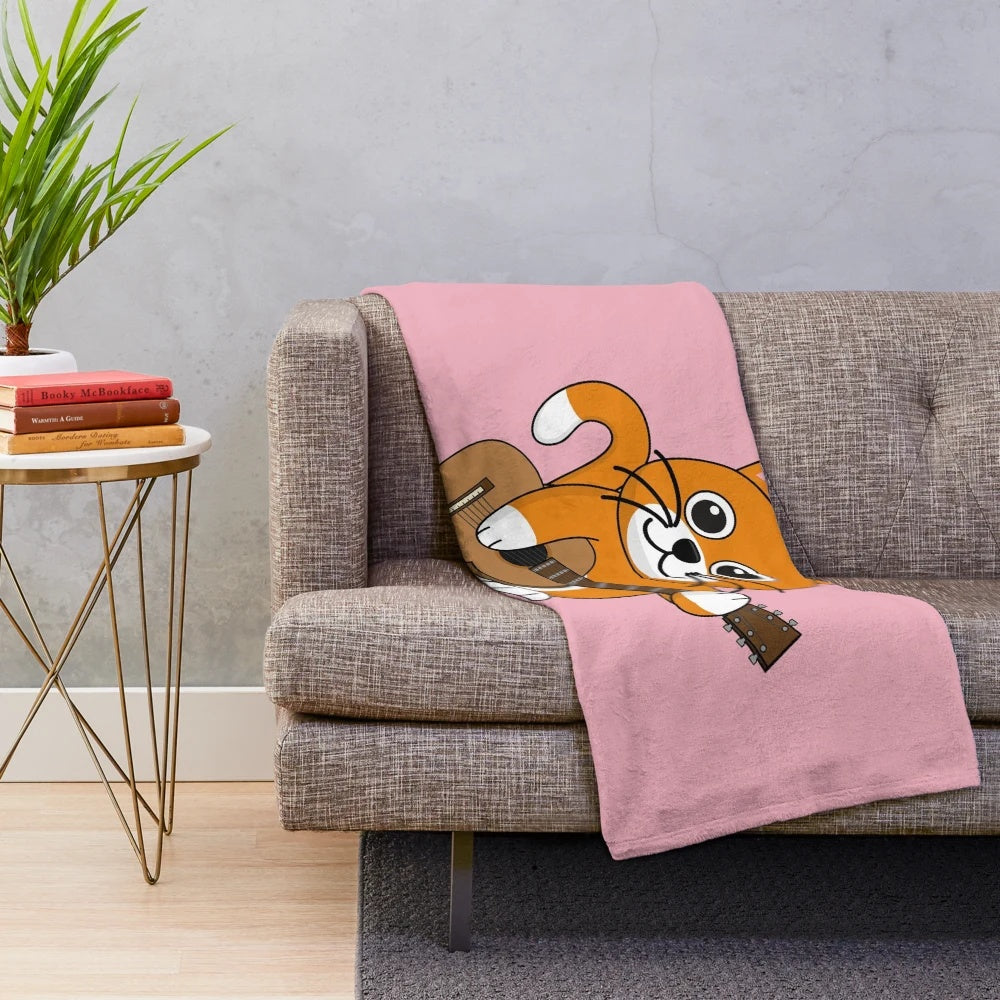 Cute cartoon cat playing guitar on a plush blanket