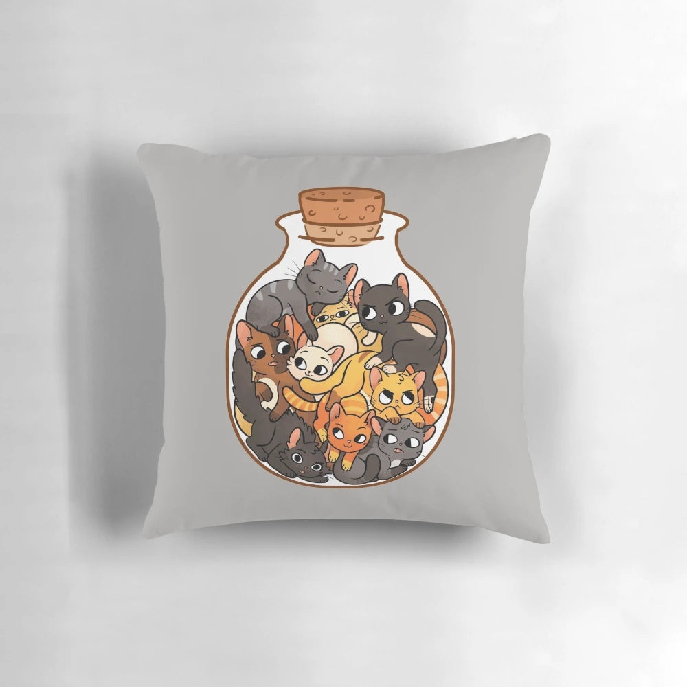 Decorative pillow with an illustration of cute tabby cats inside a glass jar