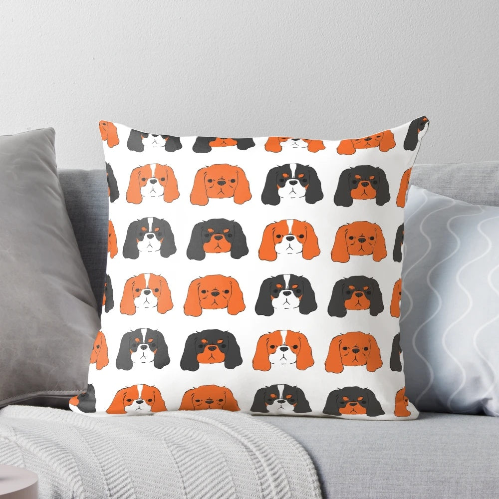 A plush, soft pillow featuring a cute Cavalier King Charles Spaniel in Blenheim, tri-color, ruby, and black and tan coat patterns.