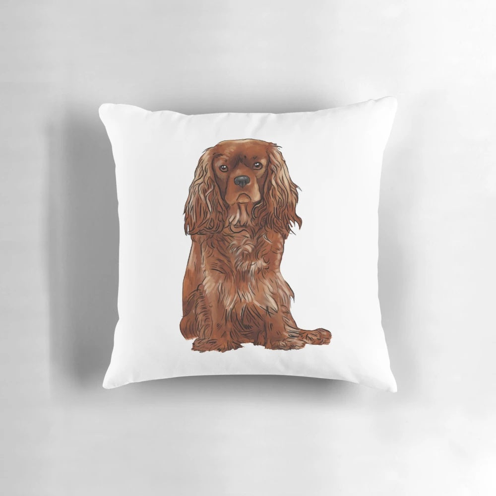 Soft, plush pillow featuring a cute and cuddly Cavalier King Charles Spaniel in a ruby color