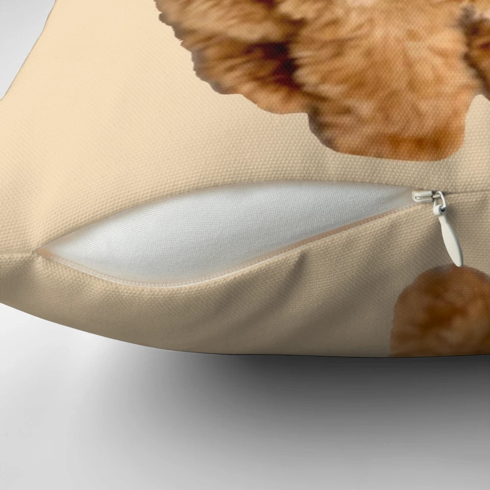 A plush, comfortable pillow featuring a cute cavapoo design