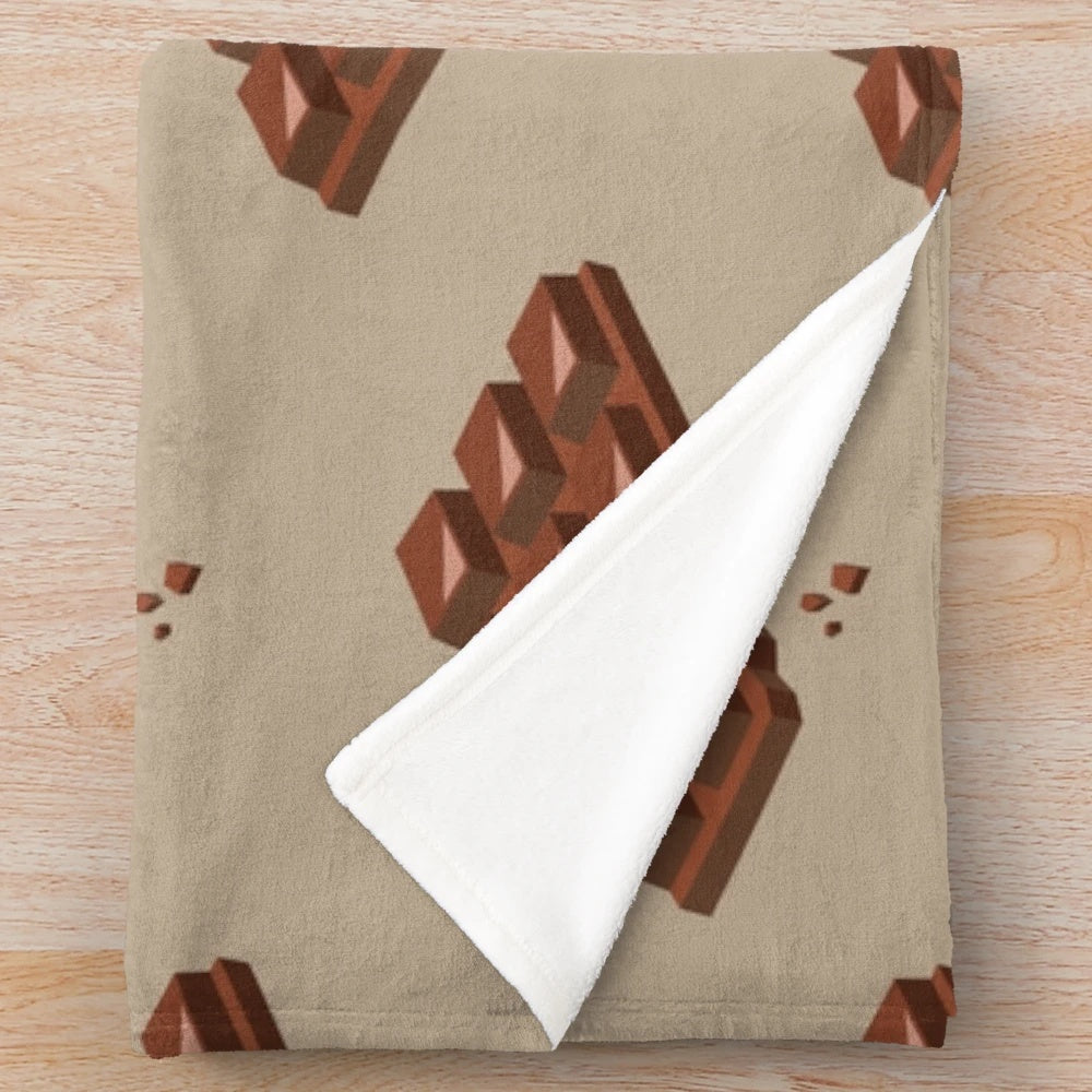 Chocolate-themed plush blanket with bitten chocolate design