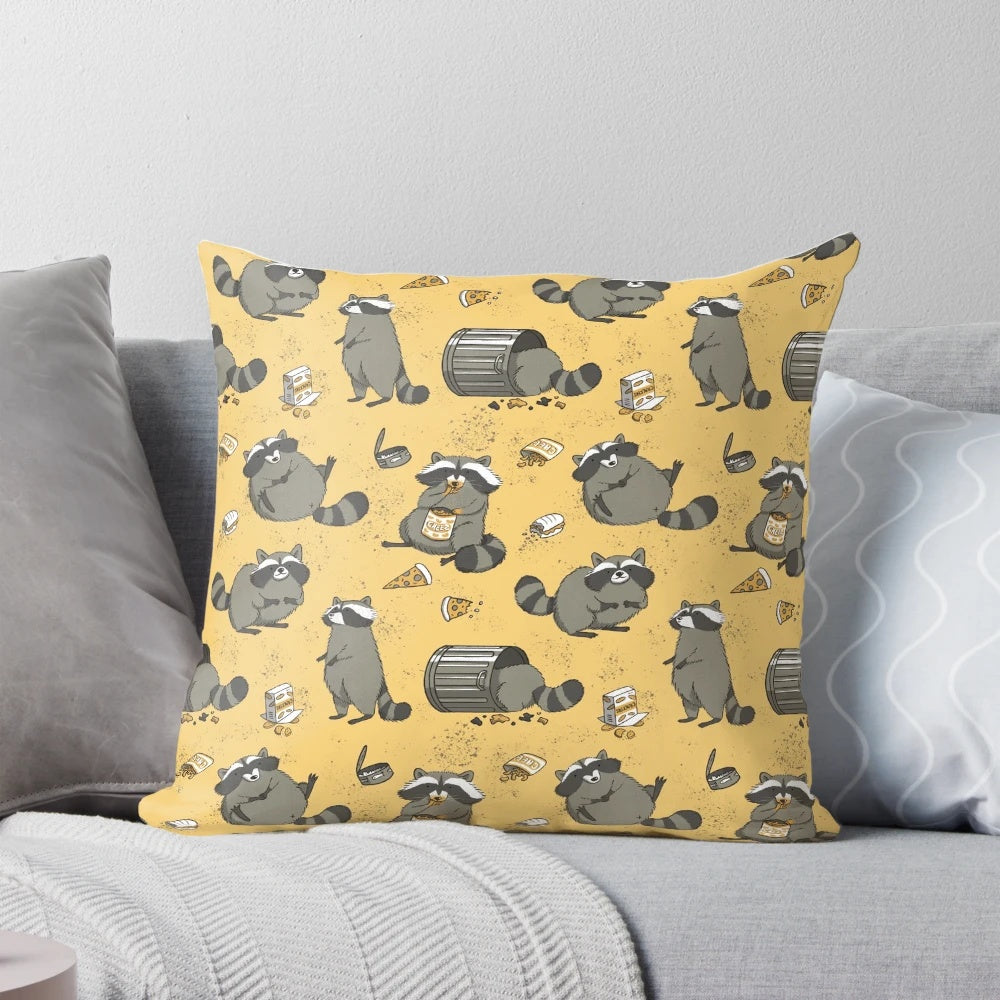 Illustration of a chubby, cute raccoon in a black, yellow, and gray pattern on a decorative pillow