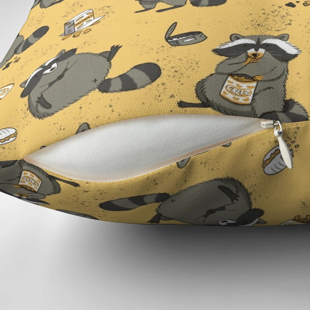 Illustration of a chubby, cute raccoon in a black, yellow, and gray pattern on a decorative pillow