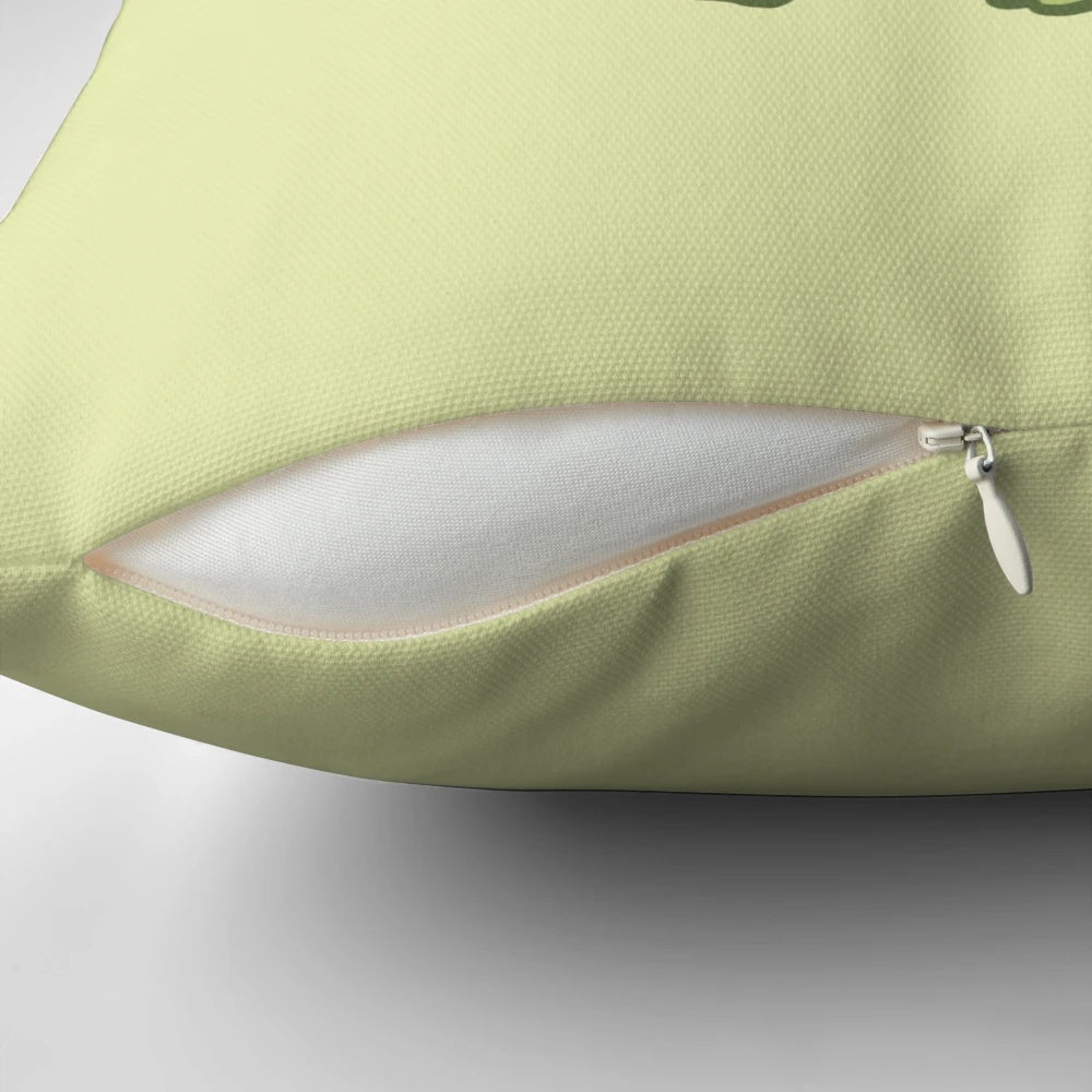 A cute, kawaii-style illustration of a frog wearing a toadstool mushroom hat, sitting next to a snail on a cottagecore-inspired pillow.