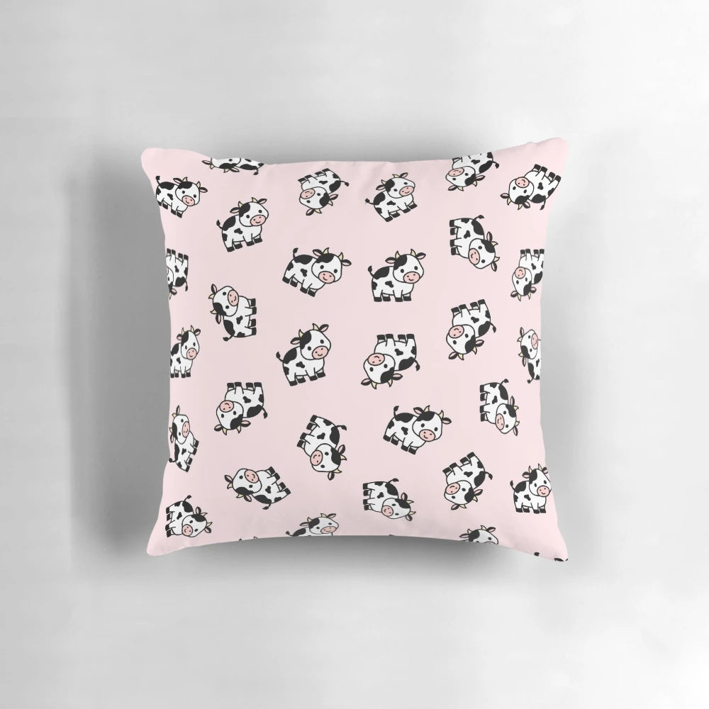 Soft, cuddly cow pillow with a pink and white design, perfect for adding a touch of country charm to any space.