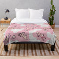 Soft and cuddly plush blanket featuring a cute cow design for anime enthusiasts
