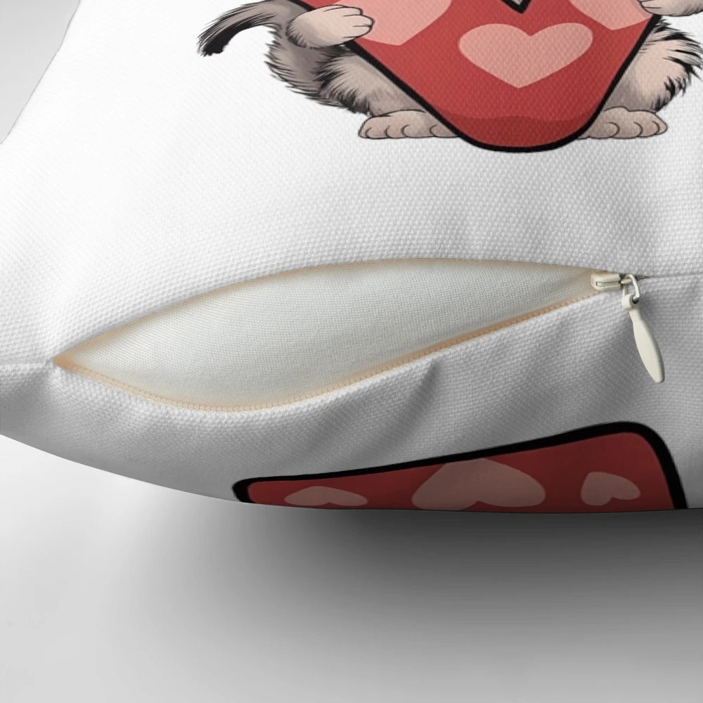 A cozy and cute cat-themed pillow, perfect for Valentine's Day gifts.