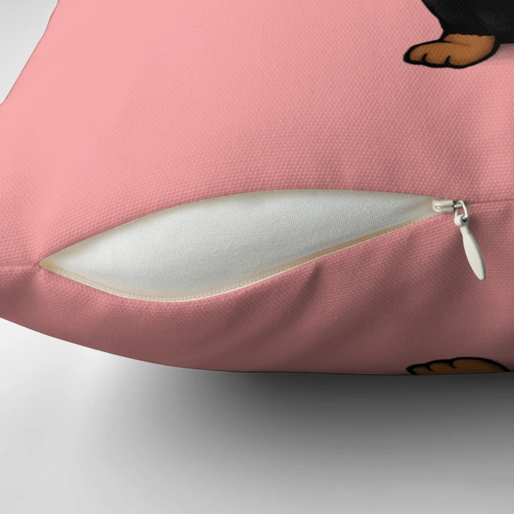 A Dachshund (wiener dog) pillow with Valentine's Day hearts in red and pink colors.