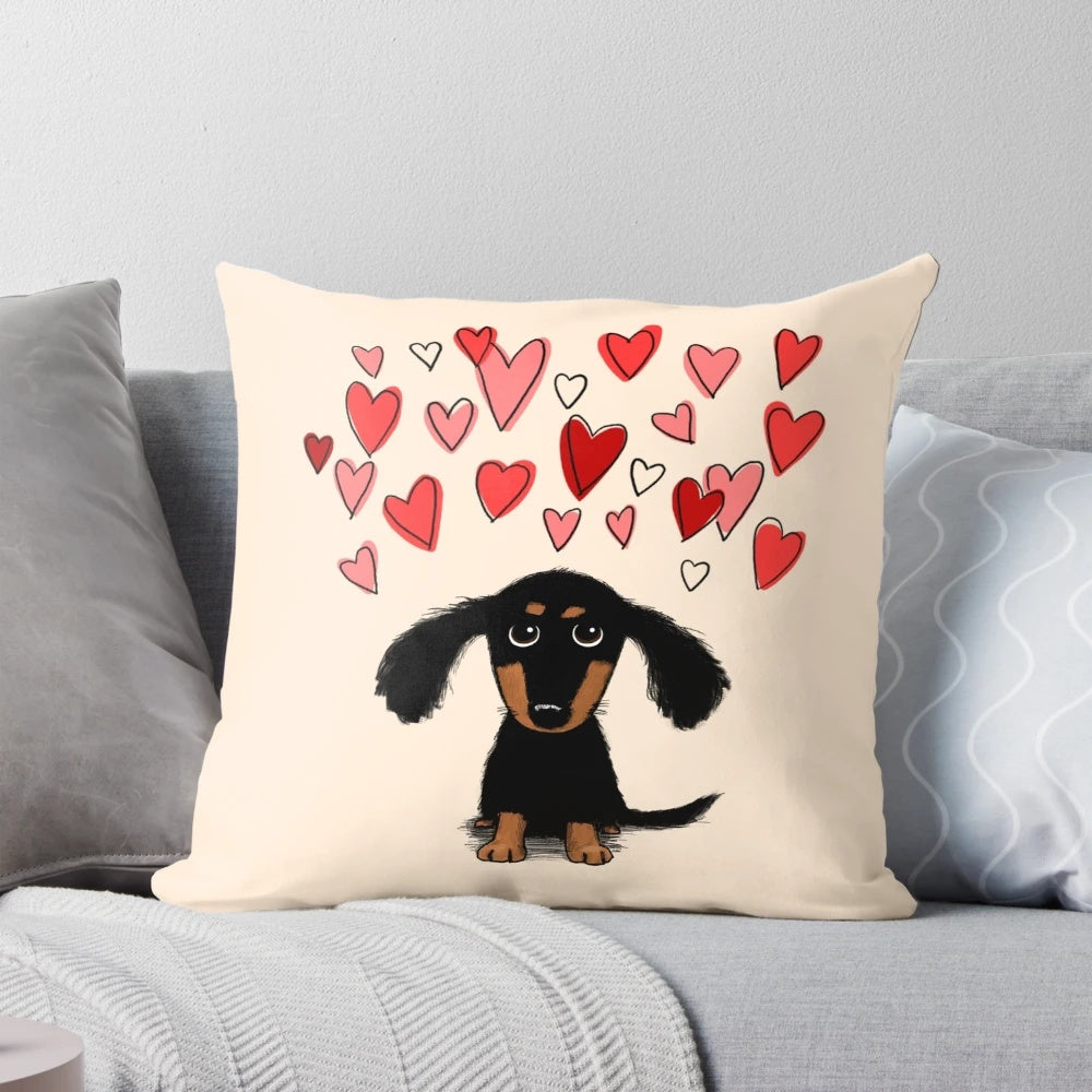 A cute dachshund puppy dog with pink and red heart designs on a throw pillow