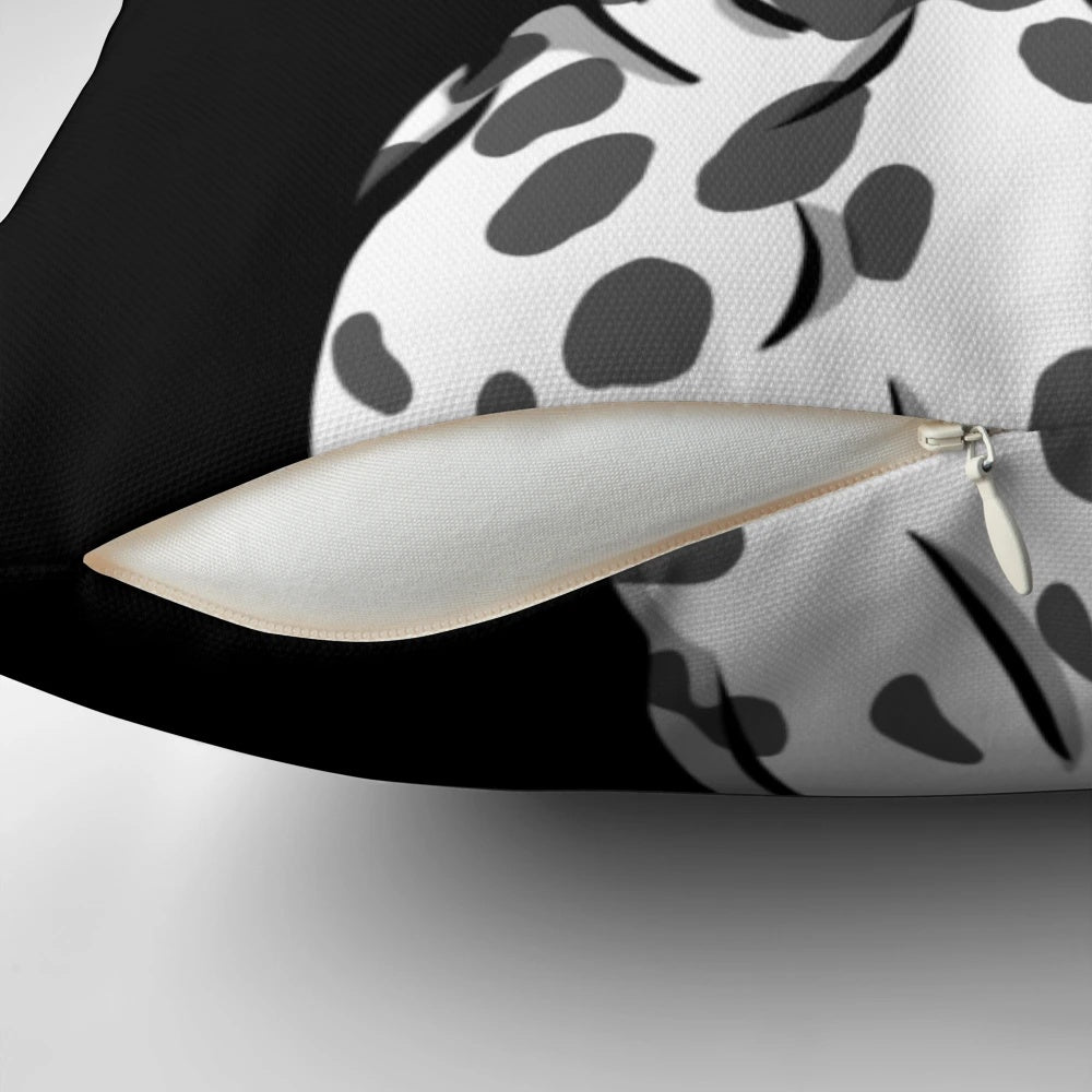 A soft, plush pillow featuring a dalmatian dog with white and grey spots, perfect for adding a touch of cute to any room.