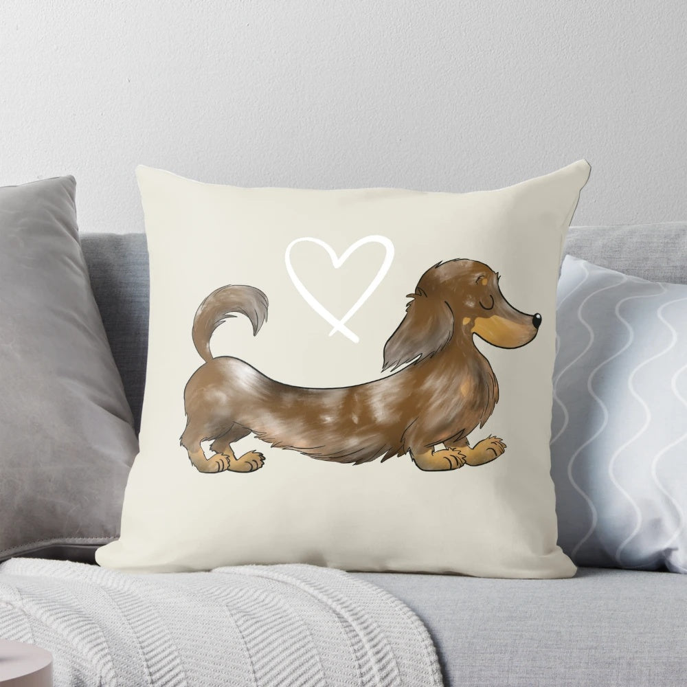 A soft, plush pillow featuring an illustration of a dapple chocolate long-haired dachshund dog.