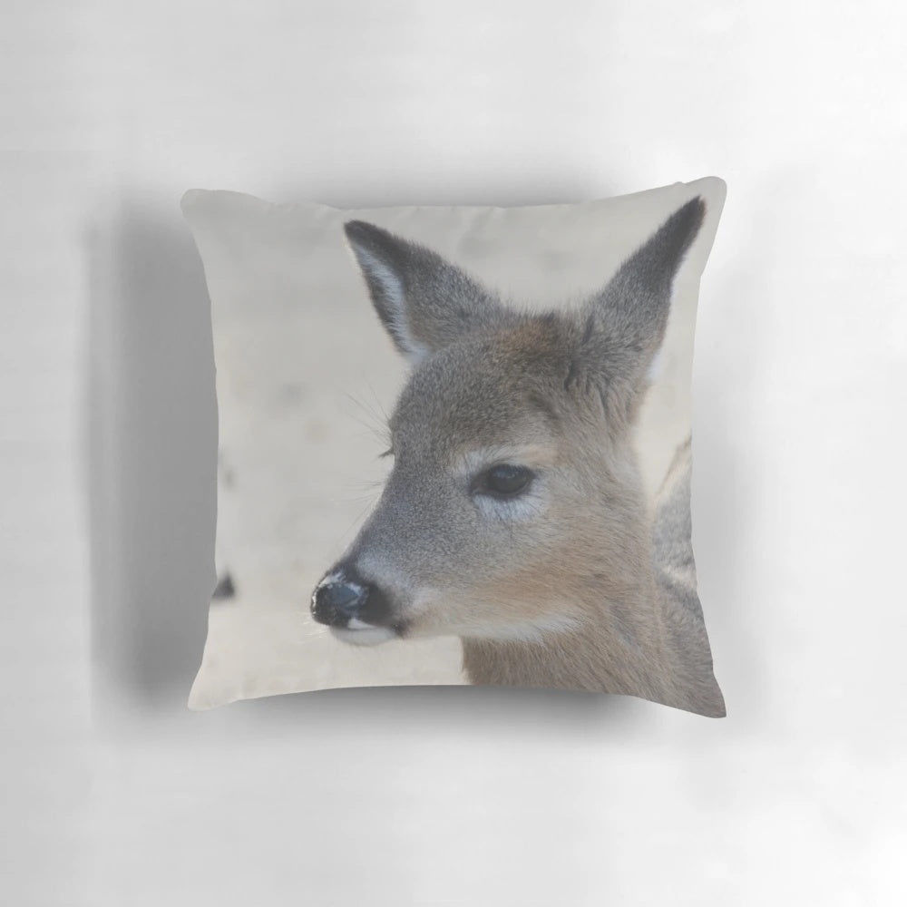 Soft, plush deer pillow featuring a realistic image of a deer