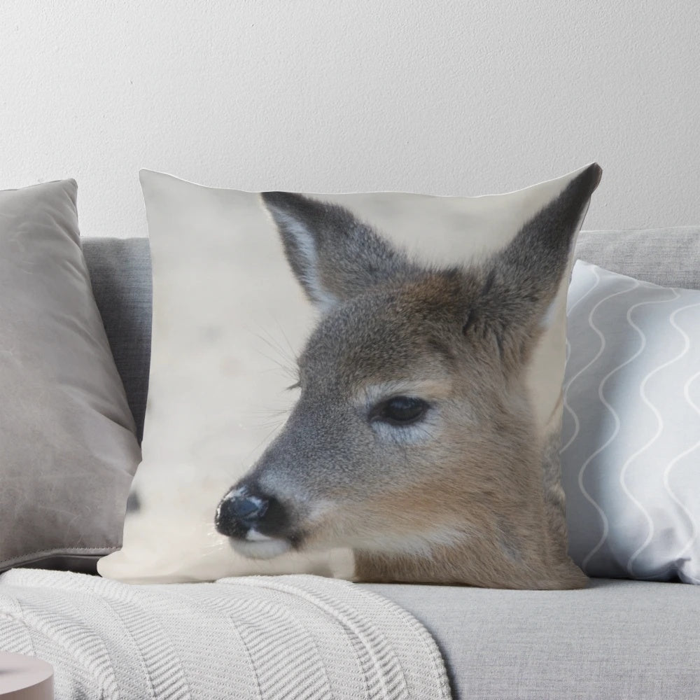 Soft, plush deer pillow featuring a realistic image of a deer