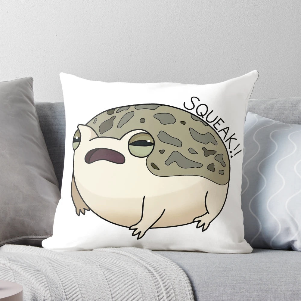 Soft, plush pillow featuring a whimsical design of a desert rain frog