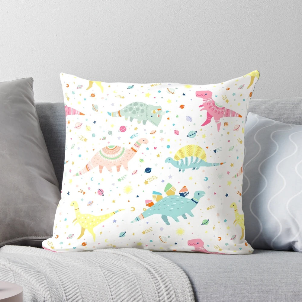 Dinosaur pattern decorative throw pillow with cute, pastel-colored dinosaurs and space-themed elements