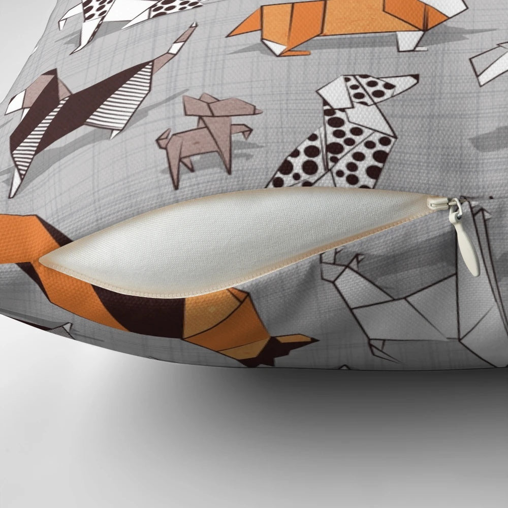 Soft, grey linen pillow with a charming dog illustration pattern in orange, grey, and brown tones.