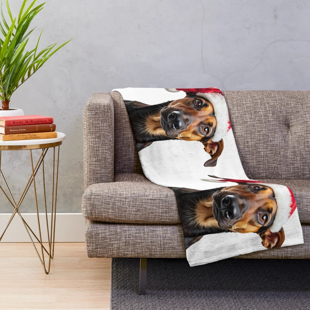 Cute dog wearing a festive Christmas hat on a soft plush blanket