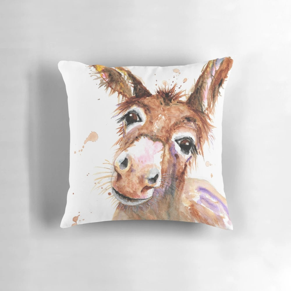 Soft, plush pillow featuring a sweet donkey face design, perfect for adding a touch of rustic charm to your home.