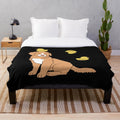 Plush blanket featuring a cute duck tolling retriever puppy and rubber ducks