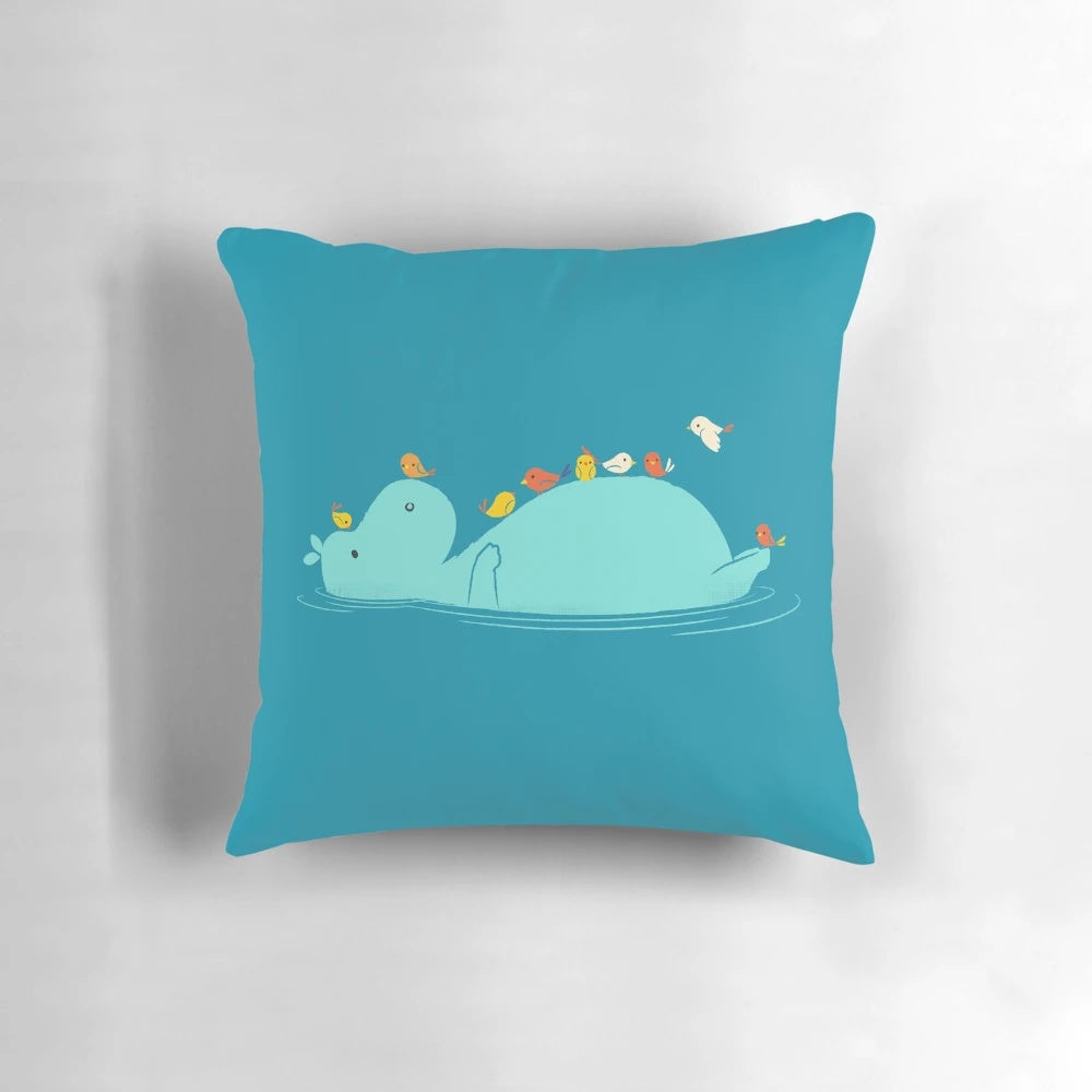 Plush All Aboard Pillow featuring a hippo and bird floating together on a river