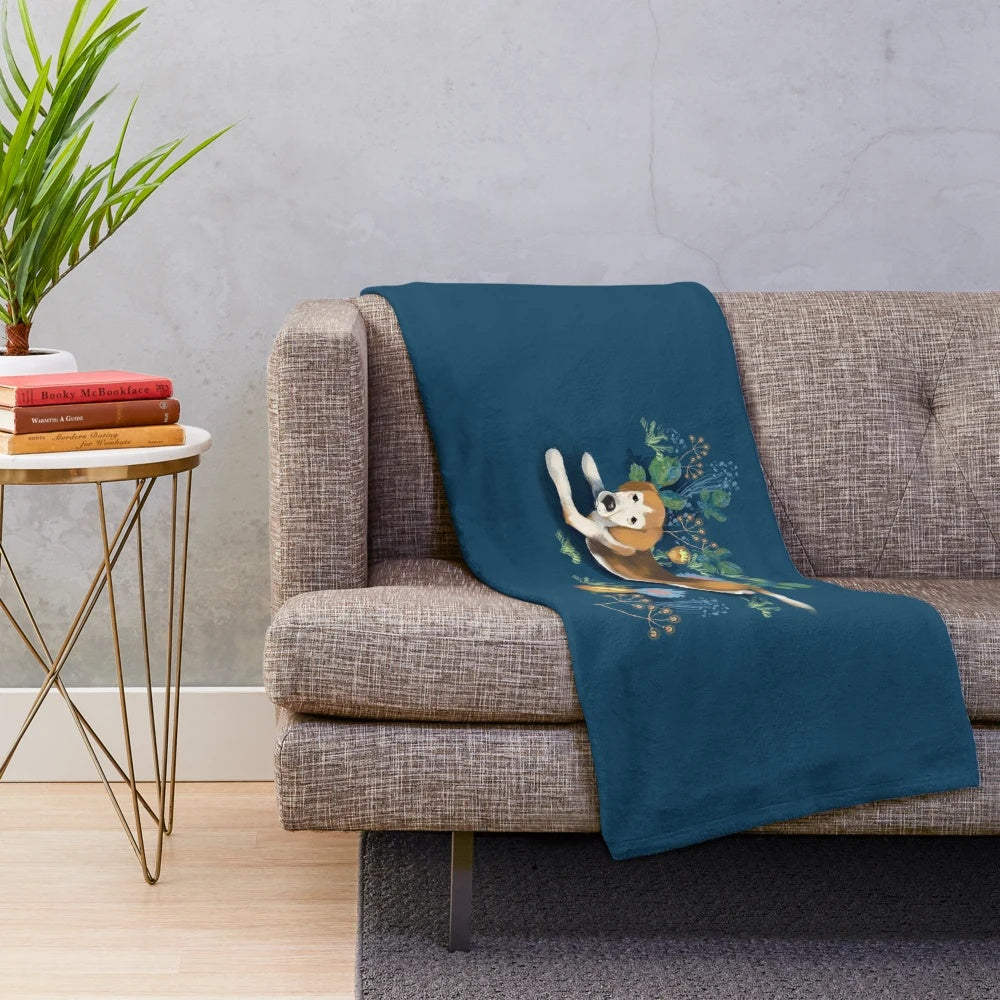 Soft and cozy plush blanket with adorable beagle art and floral design