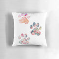 Soft, plush pillow featuring a trio of cute floral paw prints, perfect for dog owners and animal lovers.
