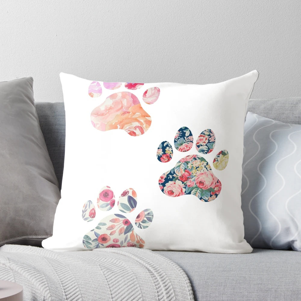 Soft, plush pillow featuring a trio of cute floral paw prints, perfect for dog owners and animal lovers.