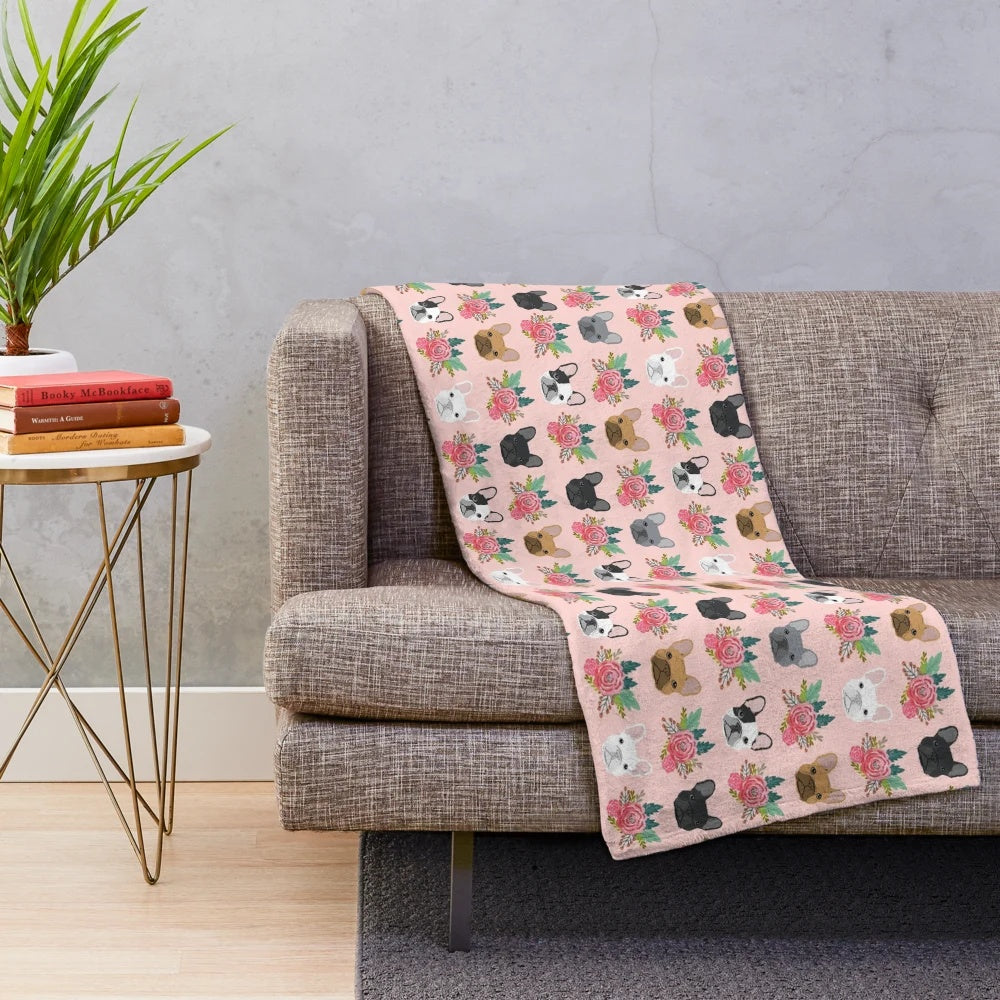 Plush blanket featuring a pink floral pattern and adorable French Bulldog faces