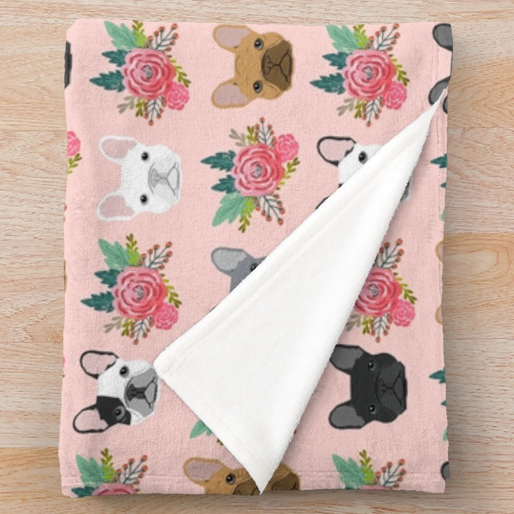 Plush blanket featuring a pink floral pattern and adorable French Bulldog faces