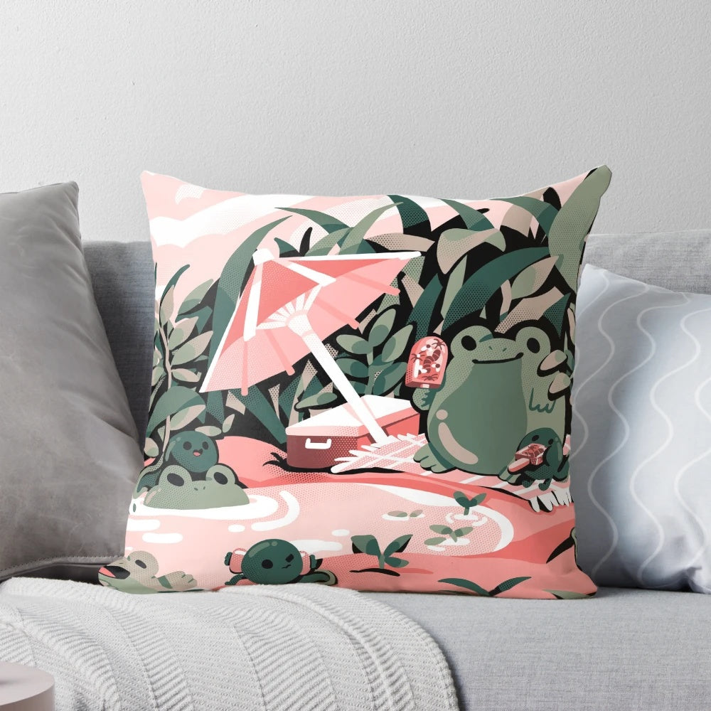 A soft, plush pillow featuring a charming illustration of a frog in a playful, nature-inspired design.