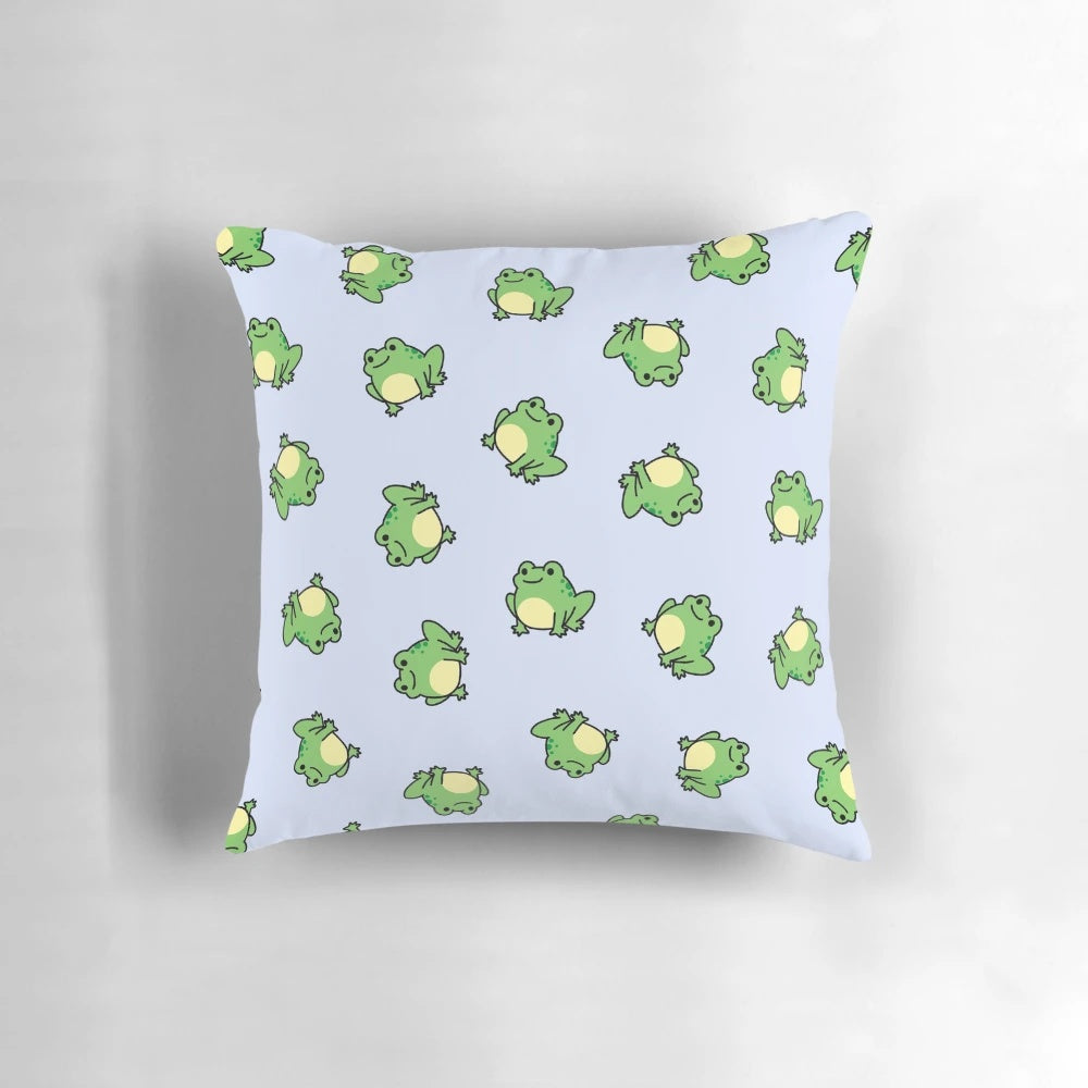 Soft, plush frog-shaped pillow in green and brown colors