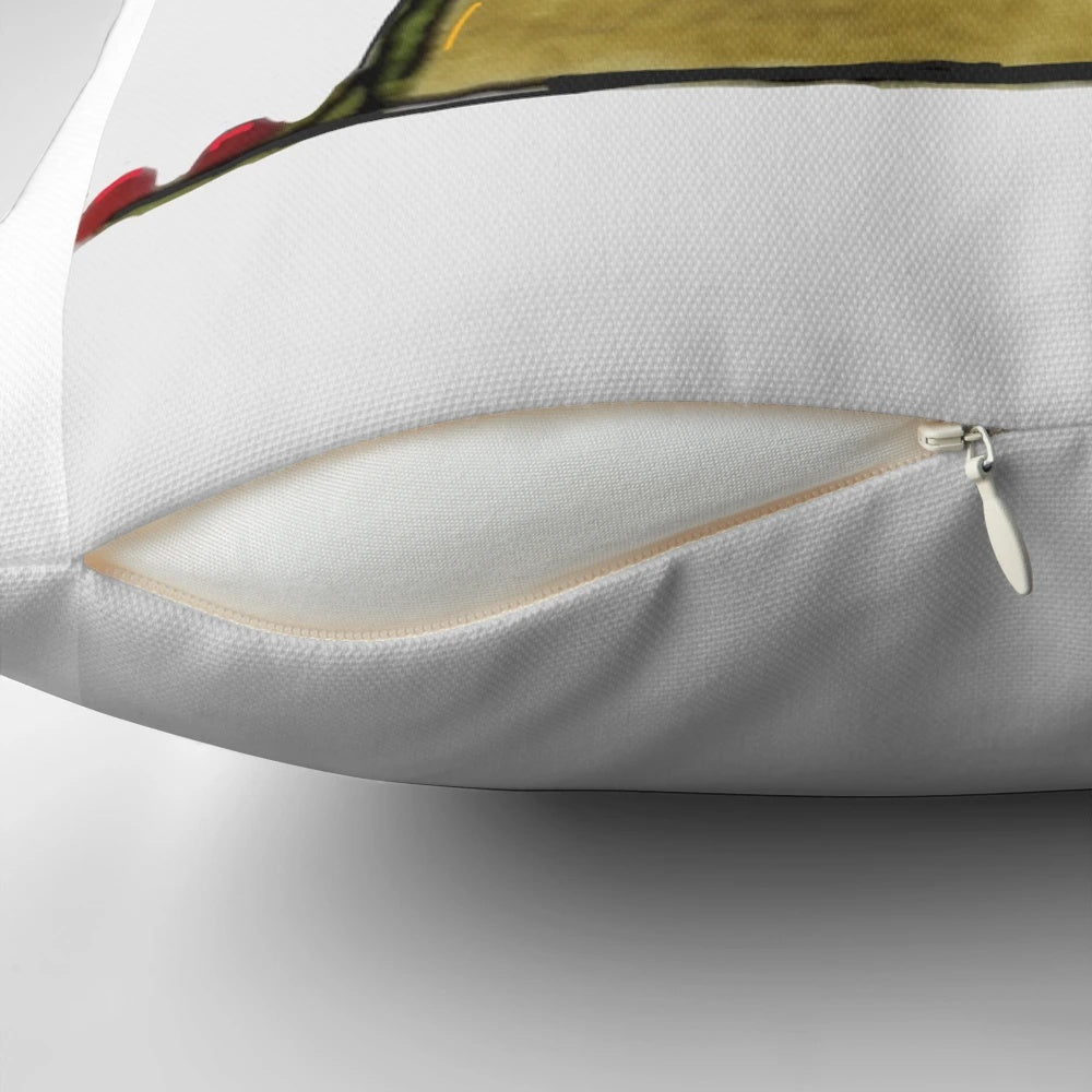 A green, heart-shaped pillow featuring a cute frog design, perfect for adding a touch of whimsy to any room.