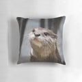 Soft and cuddly grey otter throw pillow with whiskers and cute facial expression