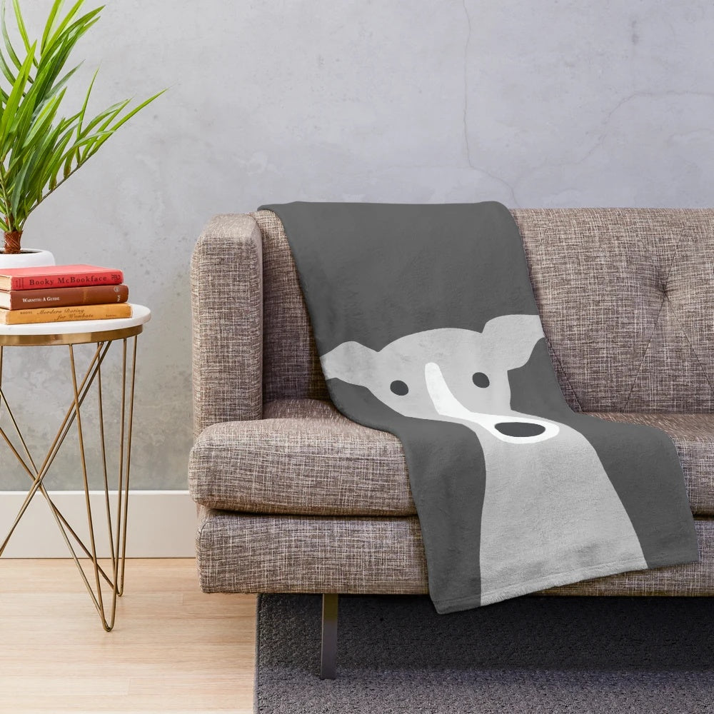 Greyhound plush blanket featuring a cute cartoon dog design