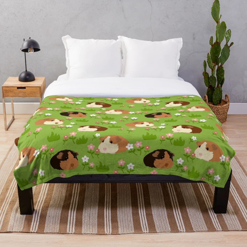 Soft and cozy plush blanket featuring an adorable guinea pig surrounded by beautiful spring flowers