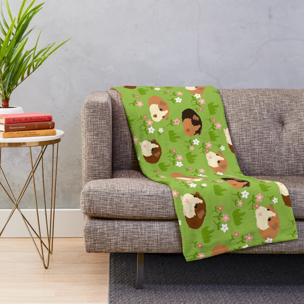 Soft and cozy plush blanket featuring an adorable guinea pig surrounded by beautiful spring flowers