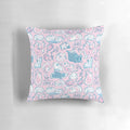 Cozy guinea pigs snuggling together in a soft, pink pillow with a floral pattern