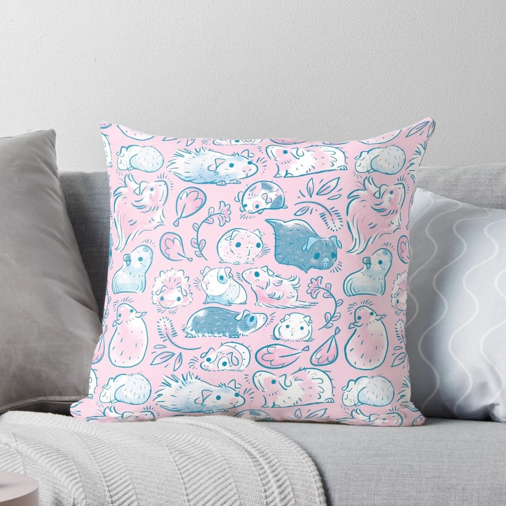 Cozy guinea pigs snuggling together in a soft, pink pillow with a floral pattern