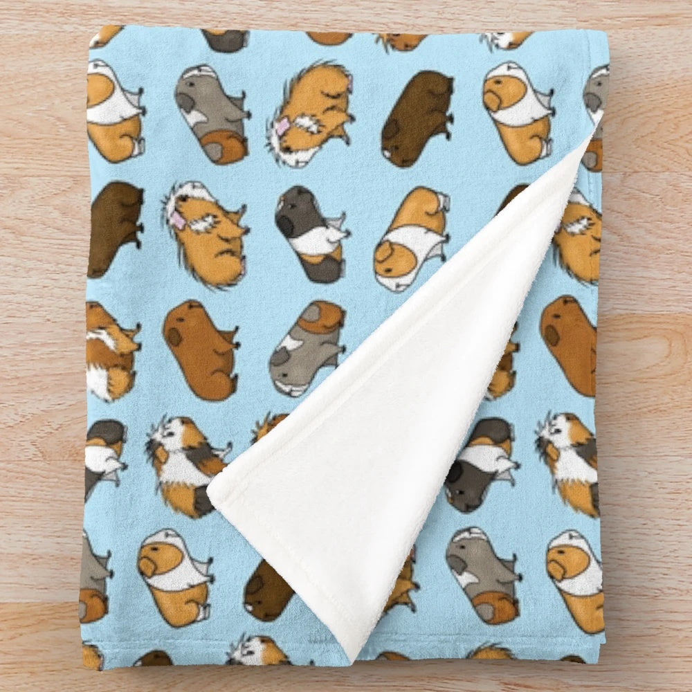 Soft and cuddly plush blanket featuring an adorable guinea pig repeat pattern design