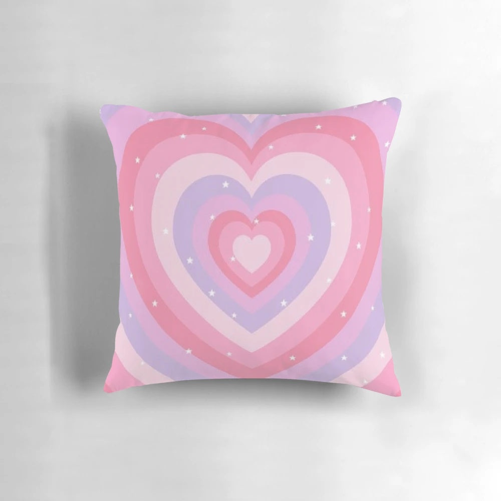 Soft, heart-shaped decorative pillow in pastel colors