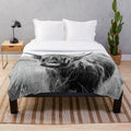 Soft and cuddly highland cow plush blanket for home decor