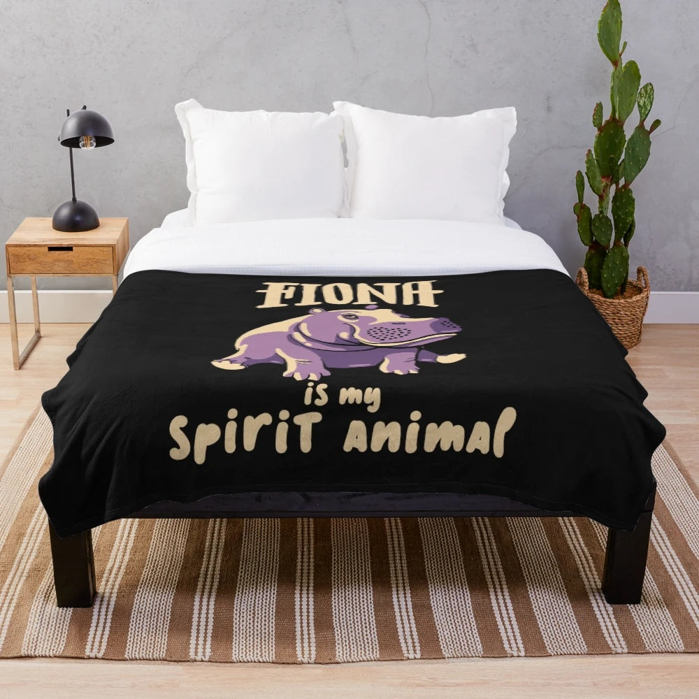 Hippo plush blanket featuring a cute baby hippo silhouette design